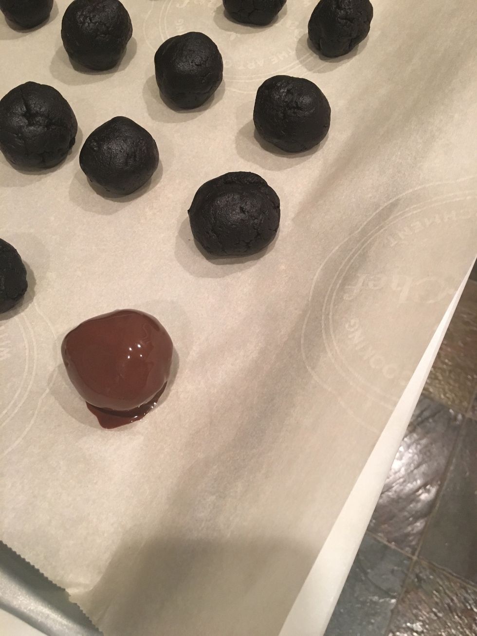 Place the covered oreo balls back onto your wax paper.