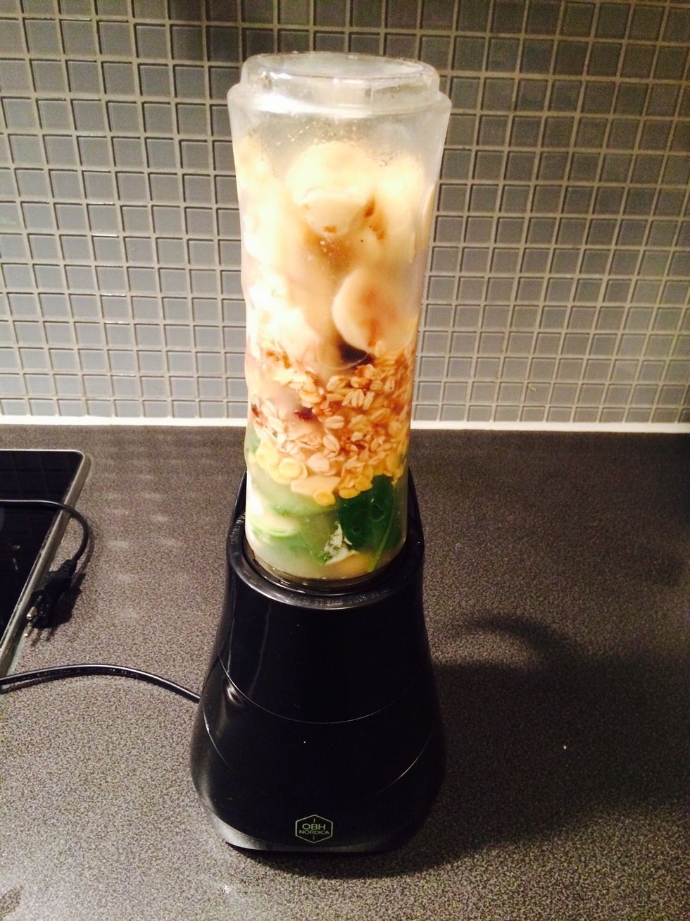 Place the cup on the blender