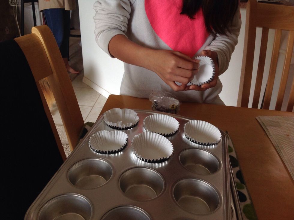 Place the cupcake liners in the cupcake pan.