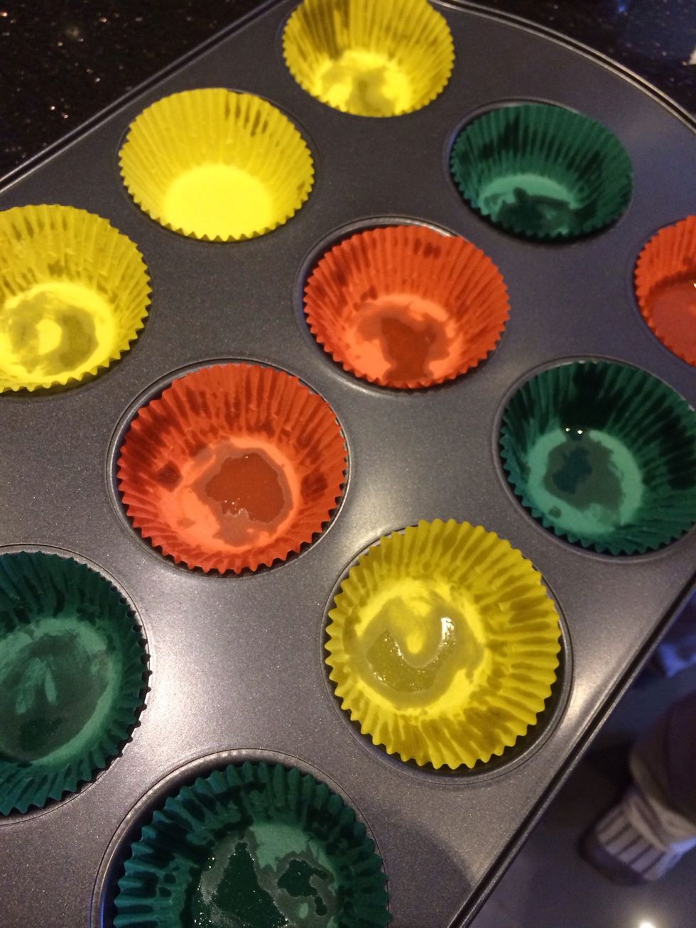 Place the cupcake moulds into a tray. If you want you can put some oil into the moulds.