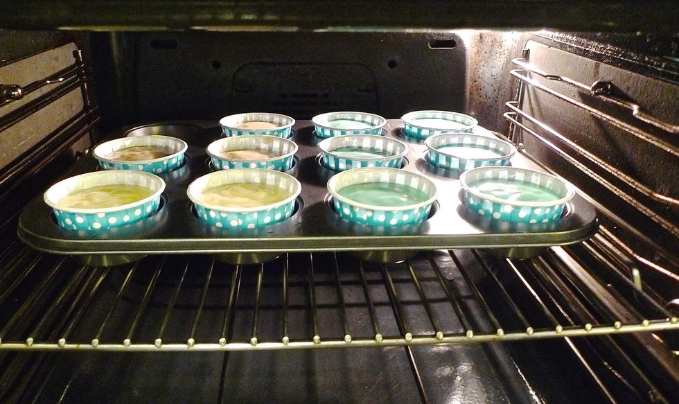 Place the cupcake muffin pan into the preheated oven.