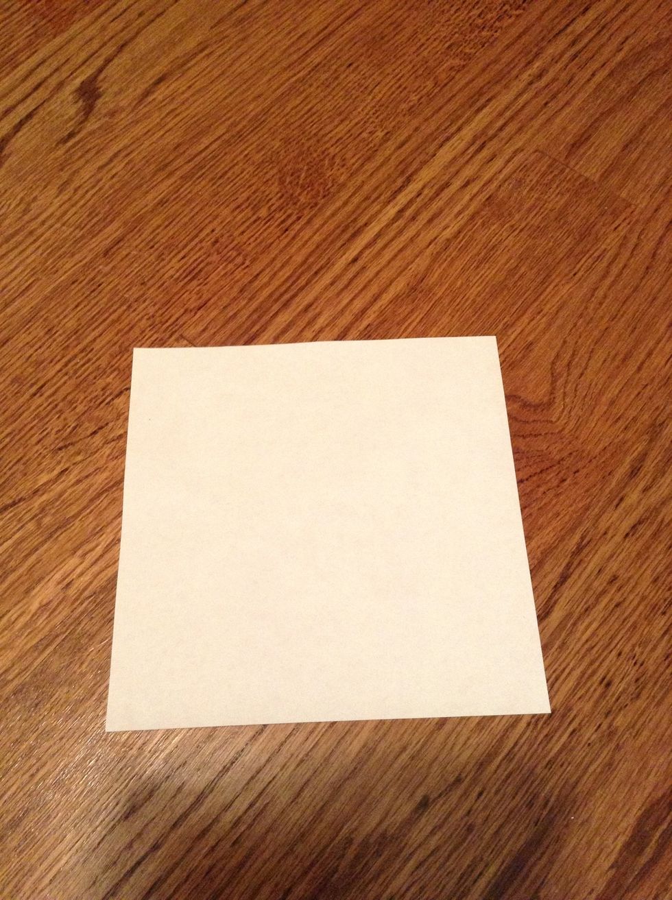 Place the design side facing down. White side up.