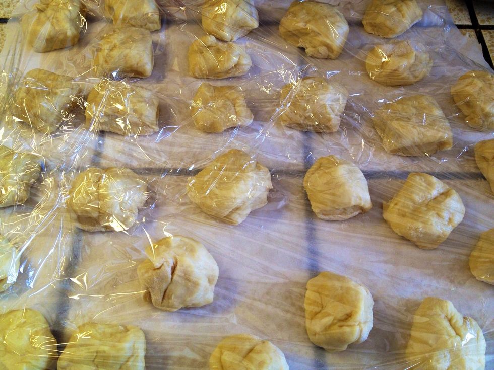 Place the dough on a floured surface and cut into 2-3 inch pieces like this.