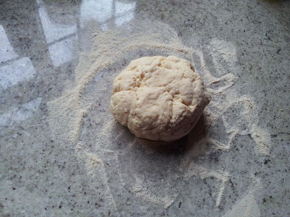 Place the dough on a floured surface and leave to rest for 15 minutes