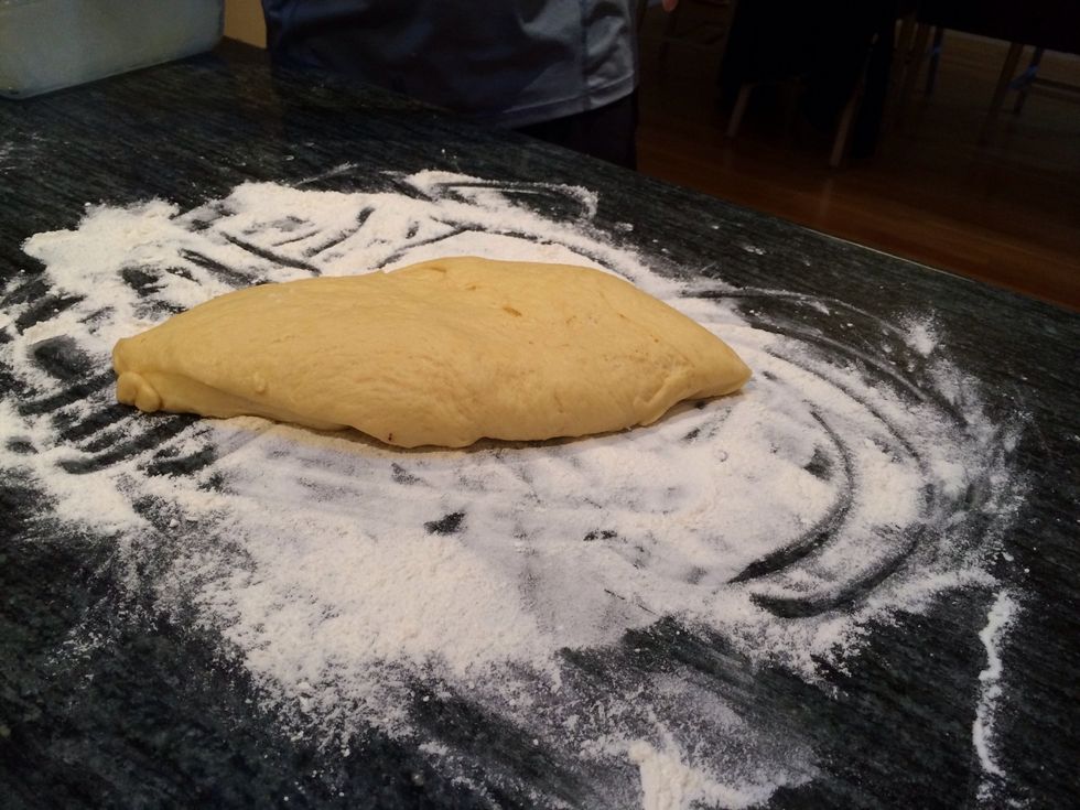 Place the dough onto a generously floured surface.