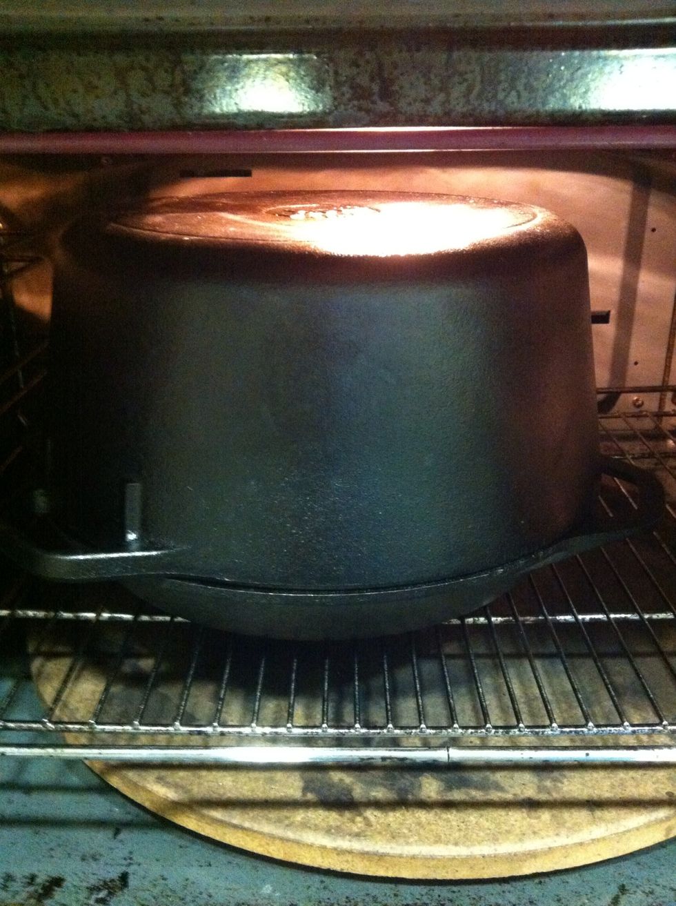 Place the Dutch oven in the oven for 20 minutes. Reduce the temperature to 450\u00ba