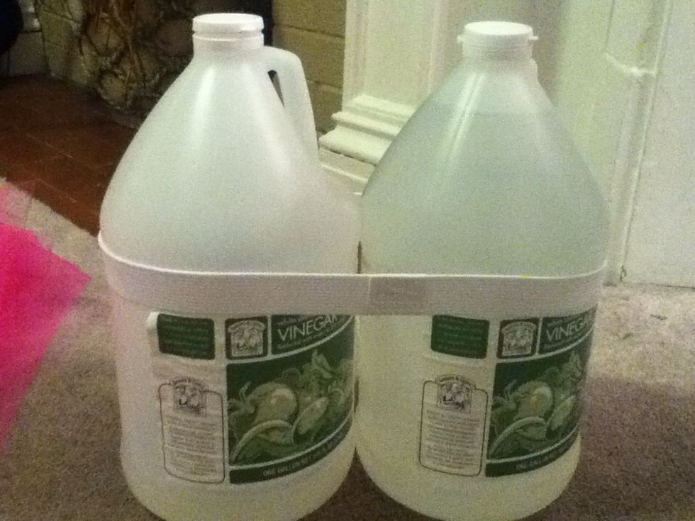 Place the elastic around 1 or 2 gallon jugs, depending upon the size of the waist band.