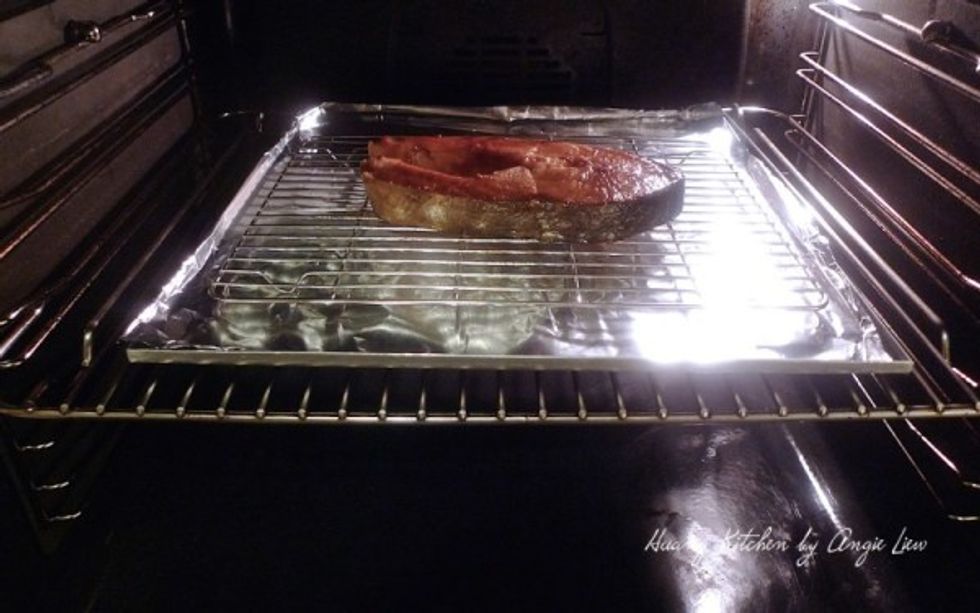 Place the fillet into oven and roast for about 3 minutes. Turn over, brush with more of the marinade and allow to cooked through, another 3 minutes.