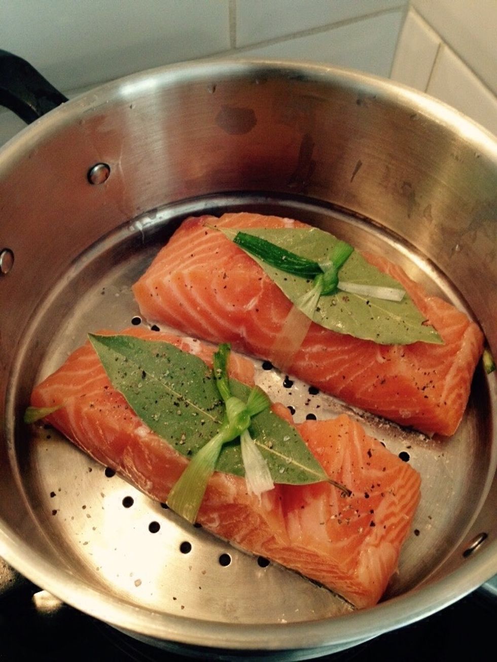 Place the fillets prepared in a tier steamer, season with salt and pepper