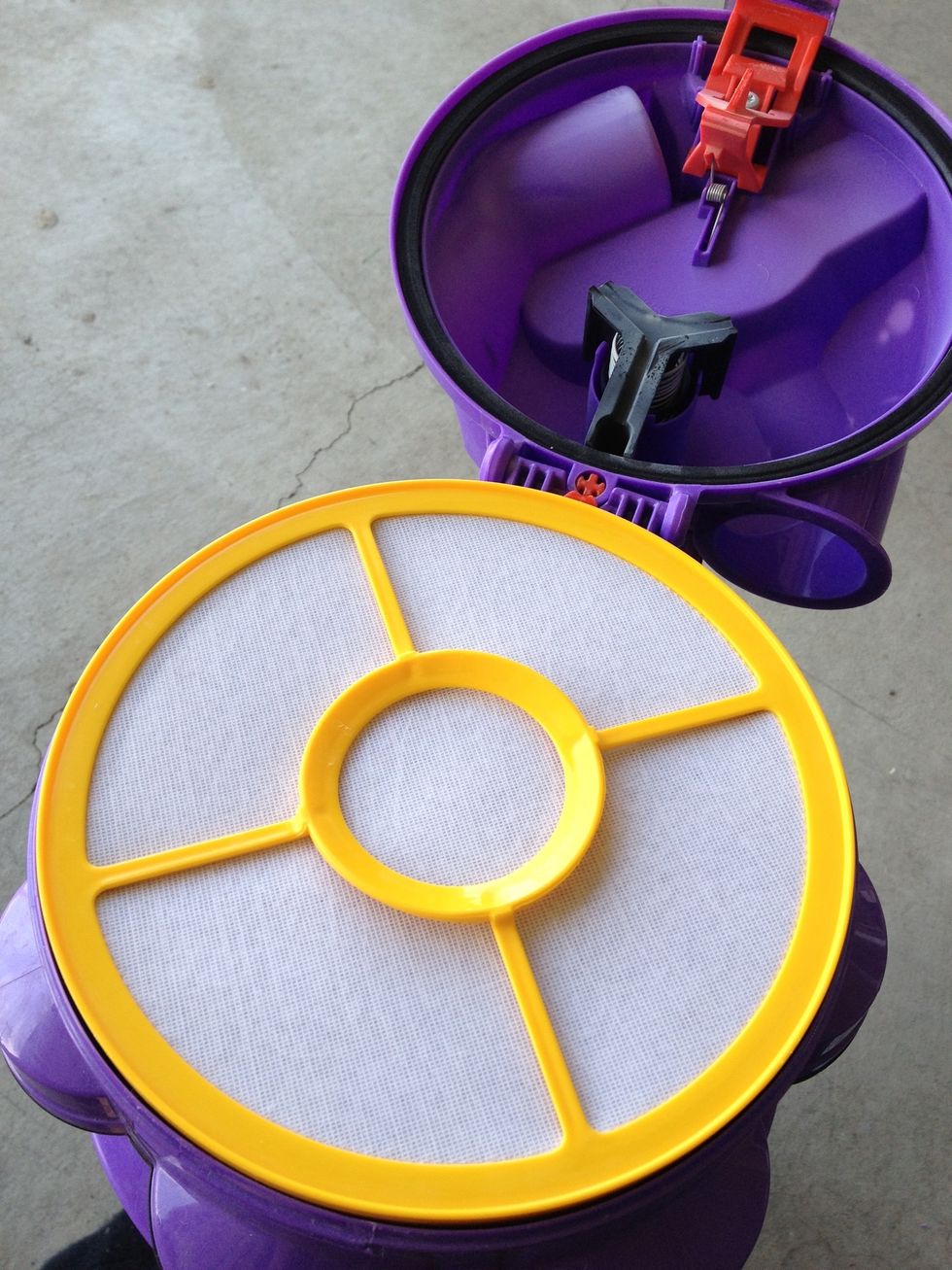 Place the filters back in the top and close the lid.