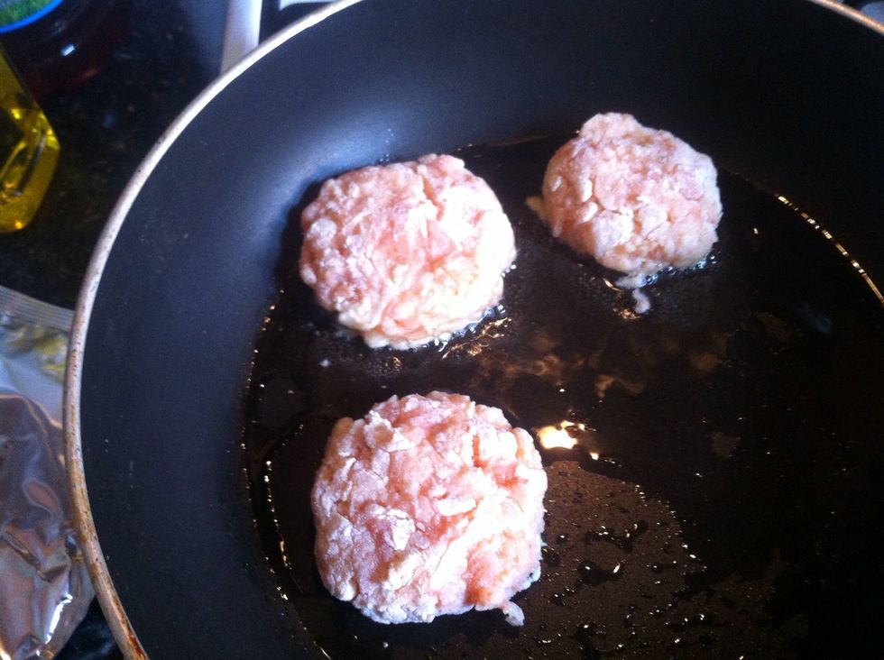 Place the fishcakes into the hot oil, keep at a medium heat.