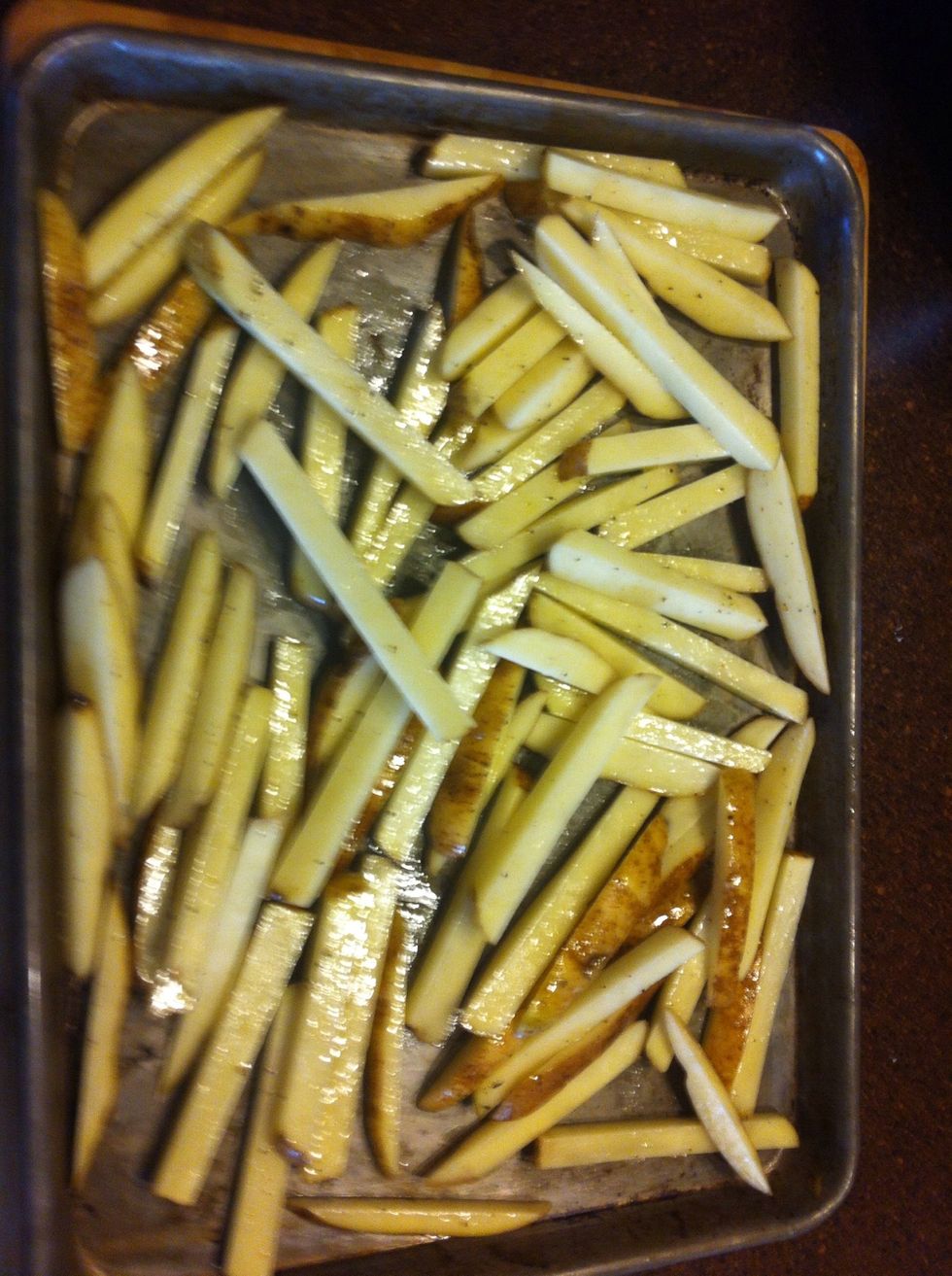 Place the fries on a baking sheet in an even layer