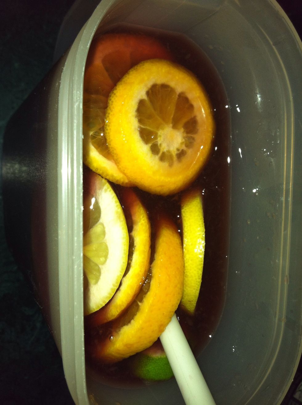 Place the fruit in the Sangria and give it a light stir