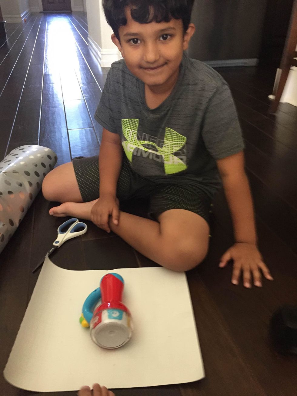 Place the gift on wrapping paper to fold.