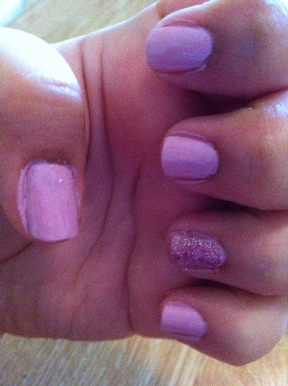 Place the glitter nail polish onto the desired nail (2 coats)