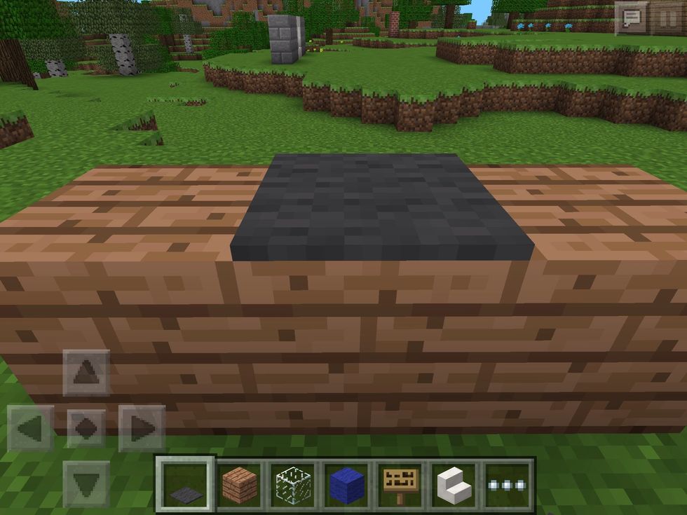 Place the grey carpet on a flat surface.