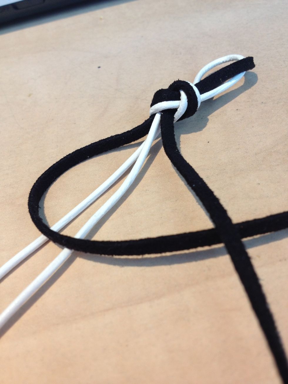 Place the left one over the middle and then the right one over the left one.