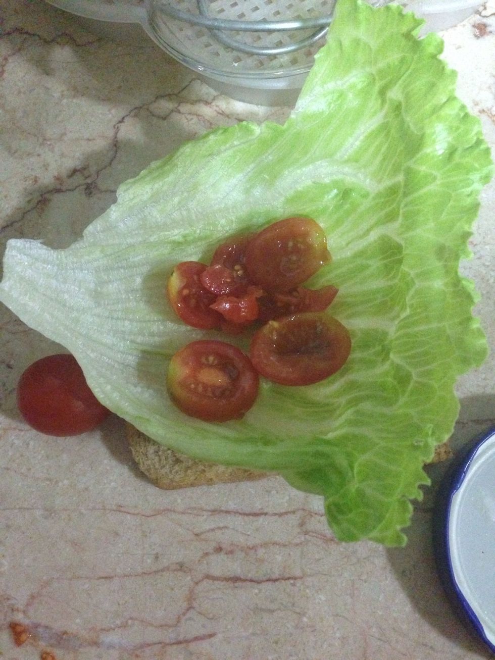Place the lettuce and tomatoes on the Toast