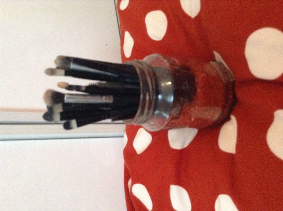 Place the make up brushes in.