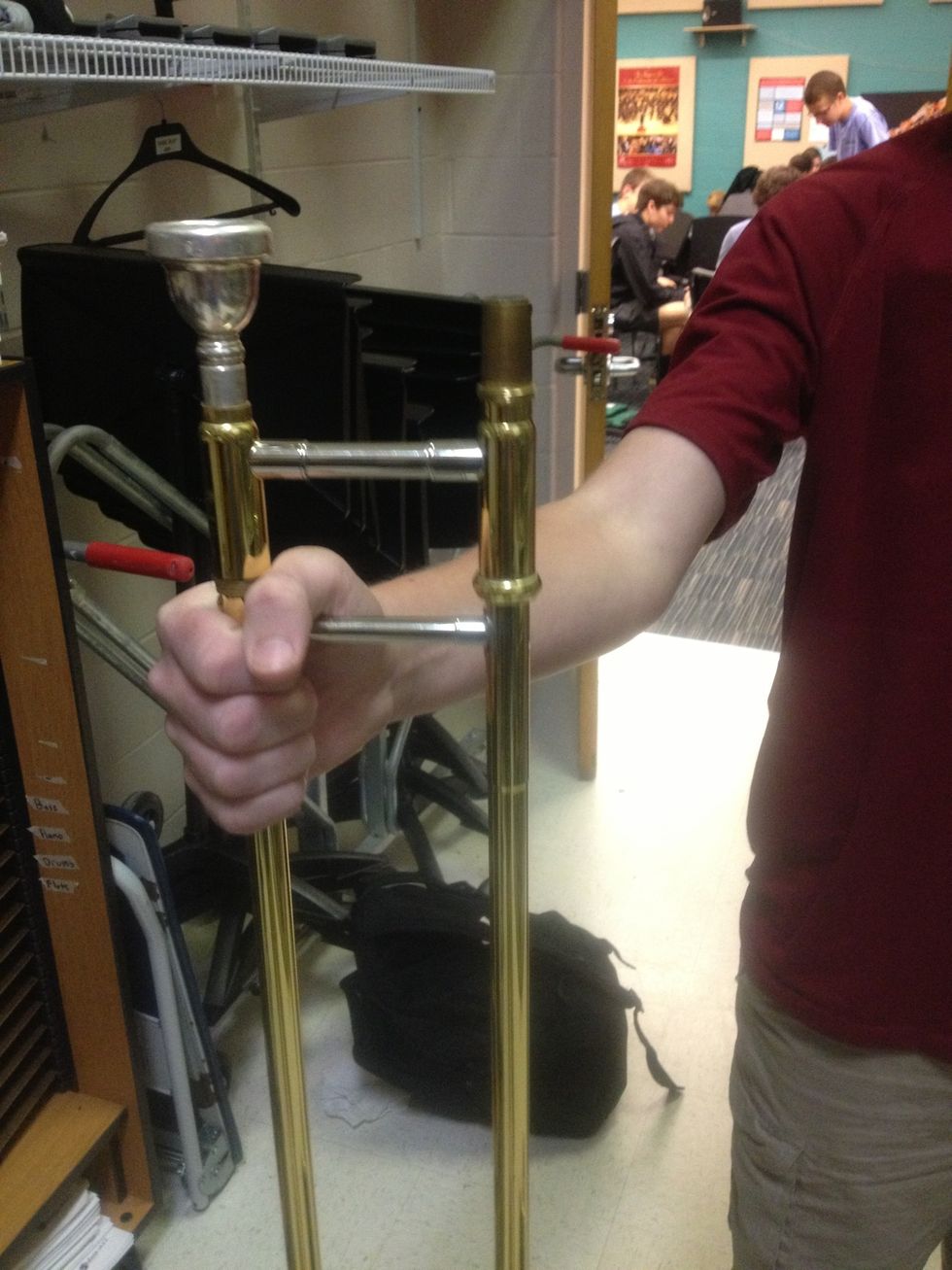 Place the mouthpiece on the shorter side of the slide.