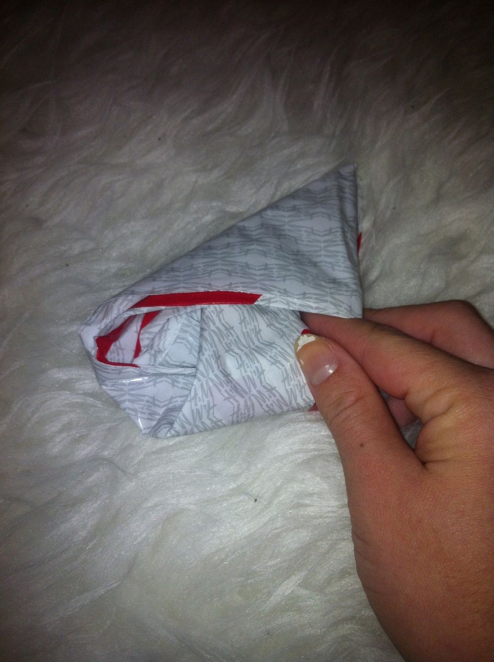 Place the "new" triangle into the old one, if you "open" the old triangle you will see that there is a opening to place the "new" triangle.