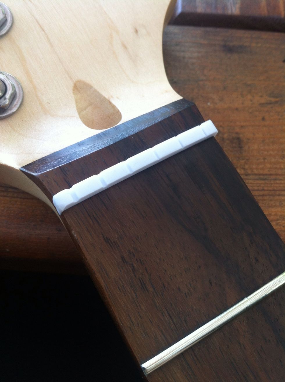 Place the nut in place