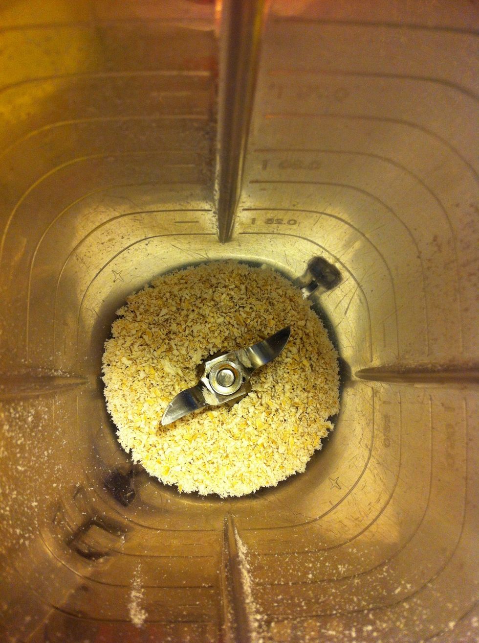 Place the oats and 2-3 pinches of the shredded coconut in a blender. Pulse until the oats form a fine mixture.
