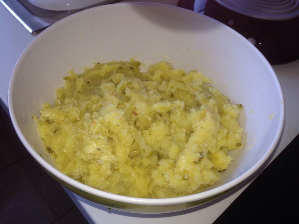 place the onion and cucumber into the rasp potatos, place the oil,vinegar,mustard and the veggi stock and stir all together. season with salt and pepper. done