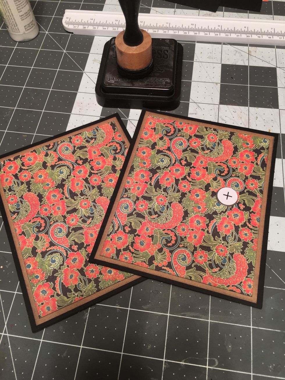 Place the other magnet on to the magnet of the front cover.Do NOT glue down. For now you just want the placement for the magnet that will later be attached to the closure piece. Set the covers aside.