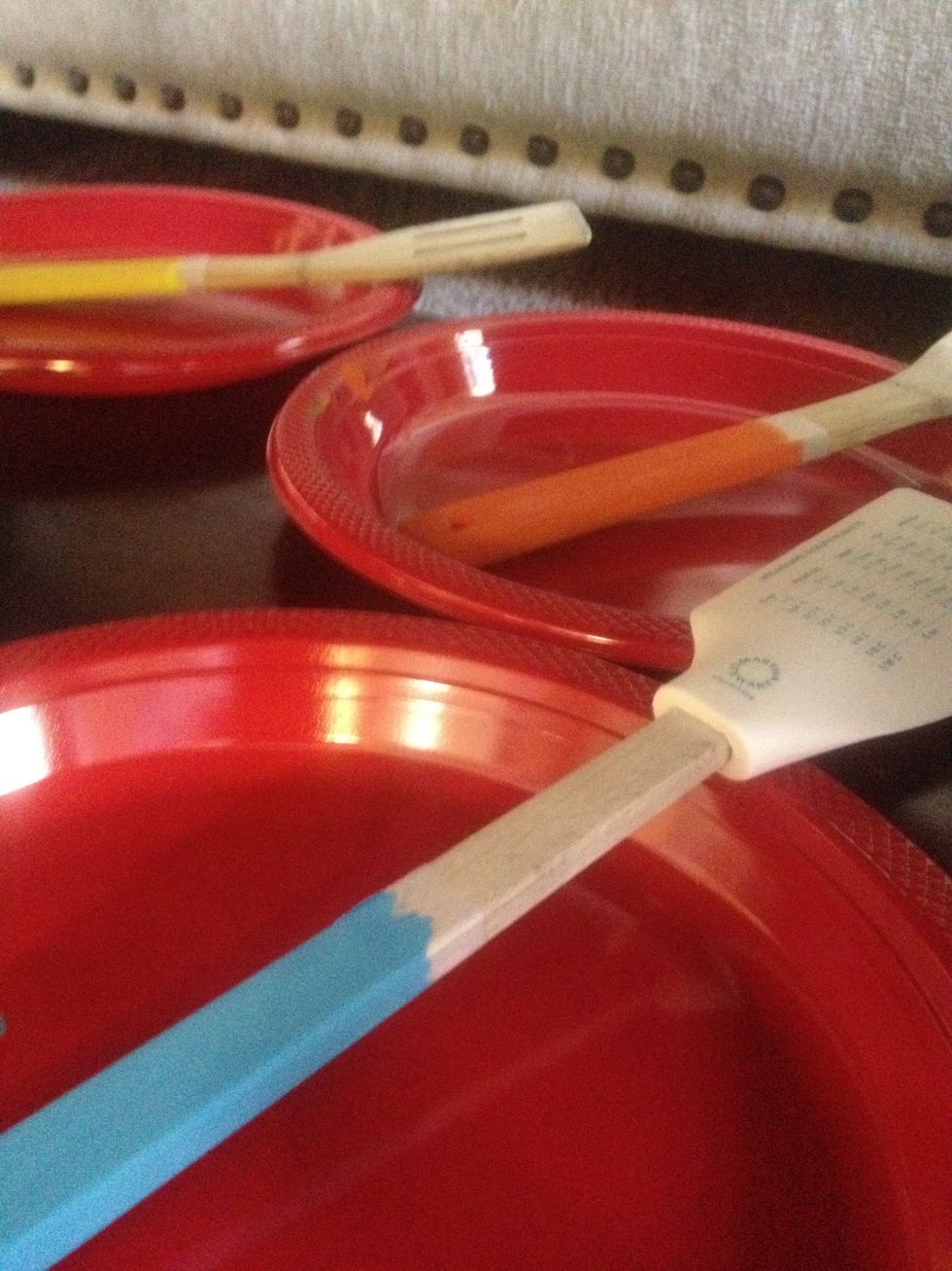 Place the painted spoon on a plastic/paper plate and let sit over night to dry. (or at least for a few hours.)