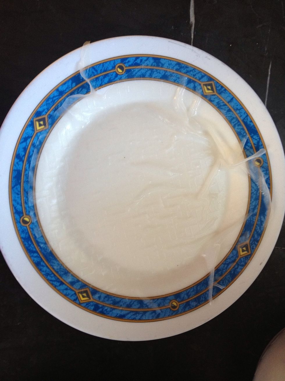 Place the paper on a plate