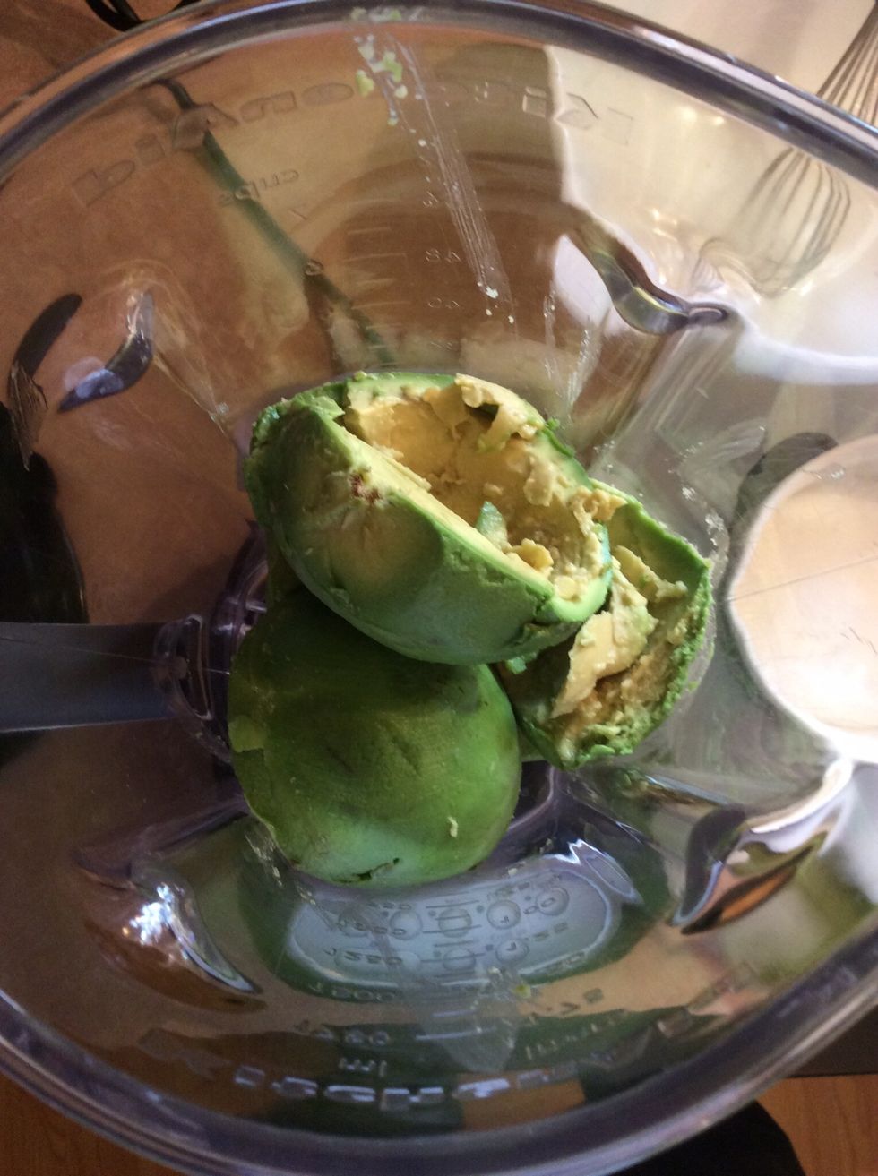 Place the peeled avocados with the seed removed into the blender.