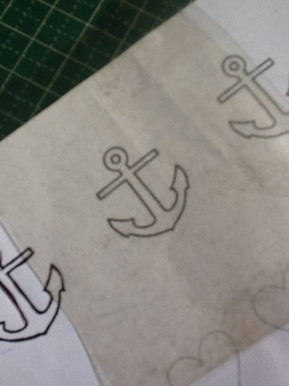 Place the plastic over anchor drawing