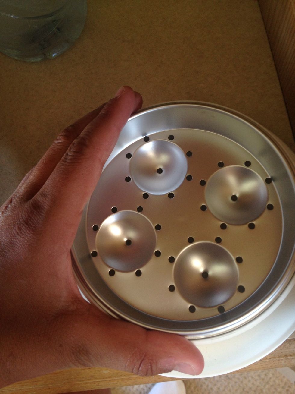 Place the plate back on top.