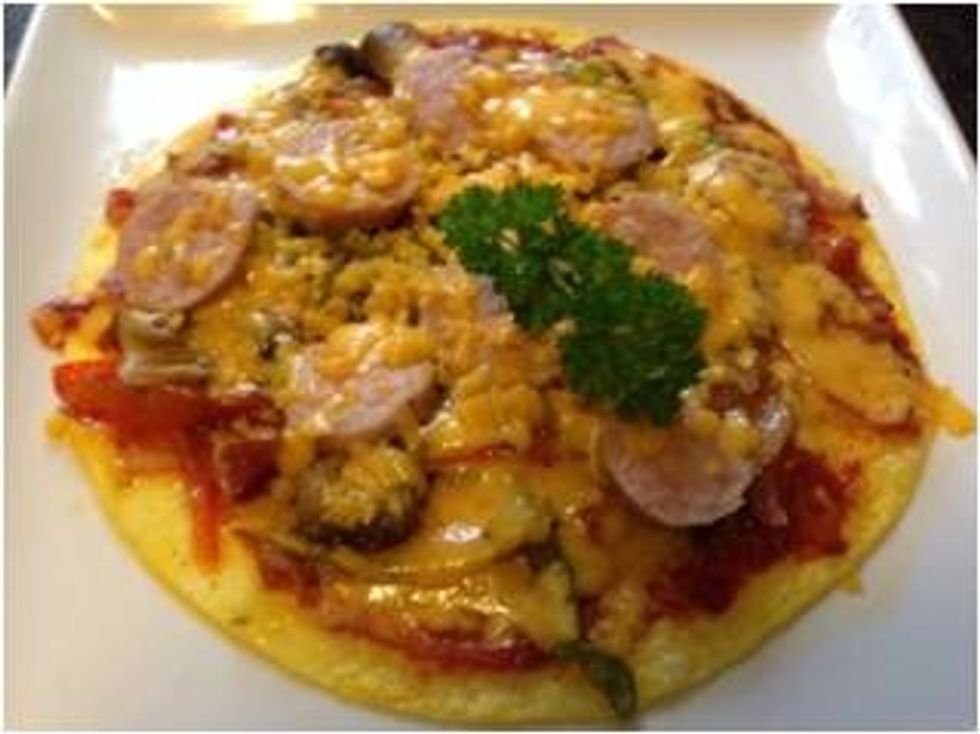 Place the plate in the microwave for 1-2 minutes to melt the cheese Then garnish and serve hot