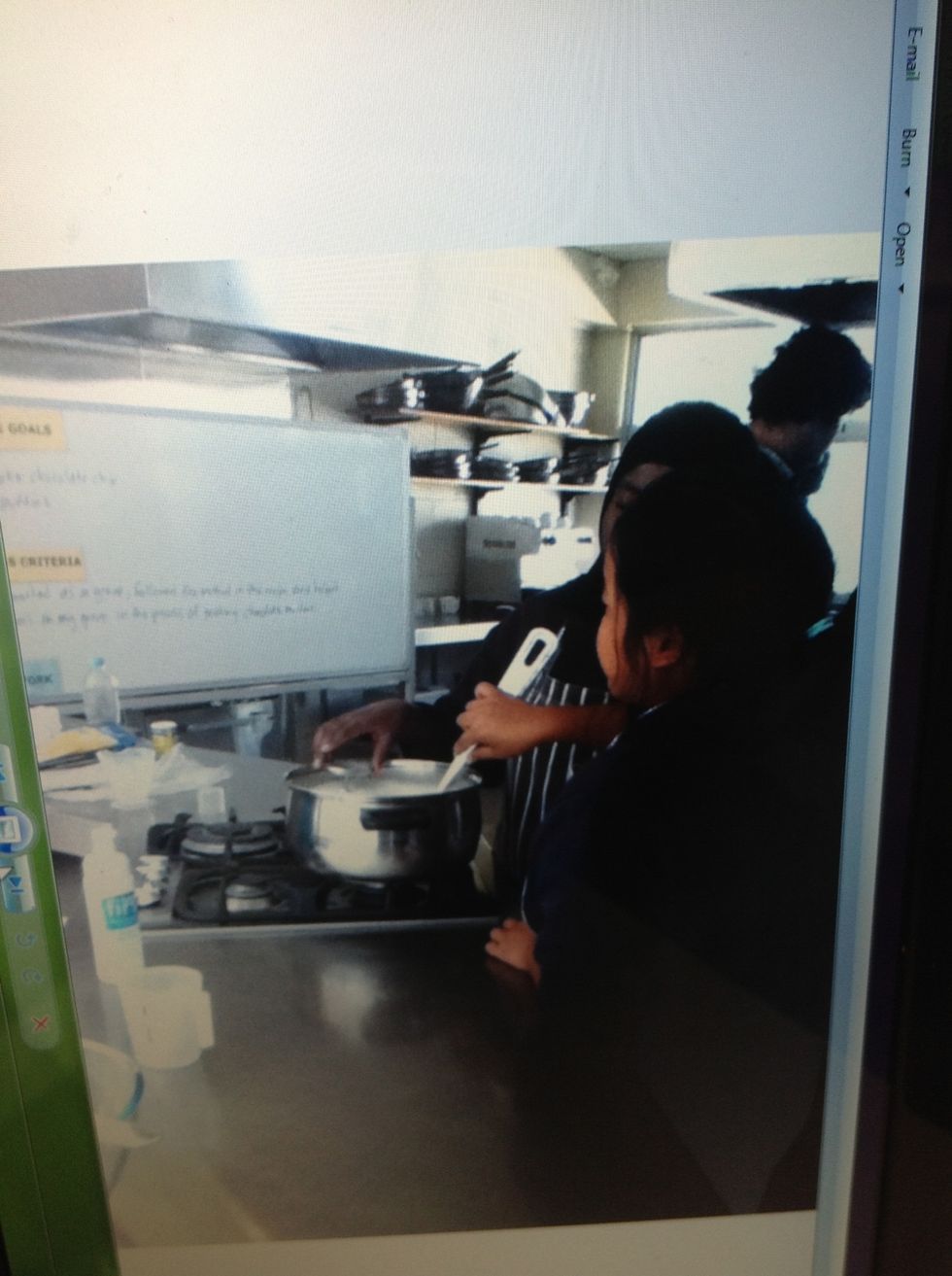 Place the pot back on the heat and heat your curds to 38degrees to 40degreesC , stirring gently to keep the curds moving around the pot.