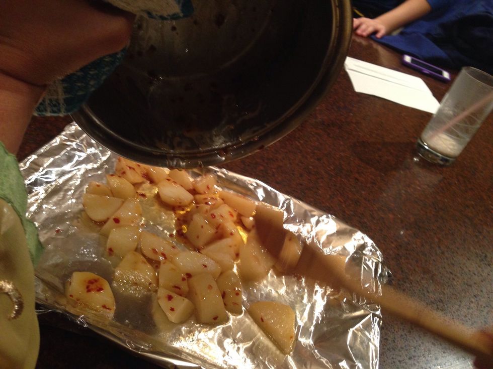 Place the potatoes into the pan