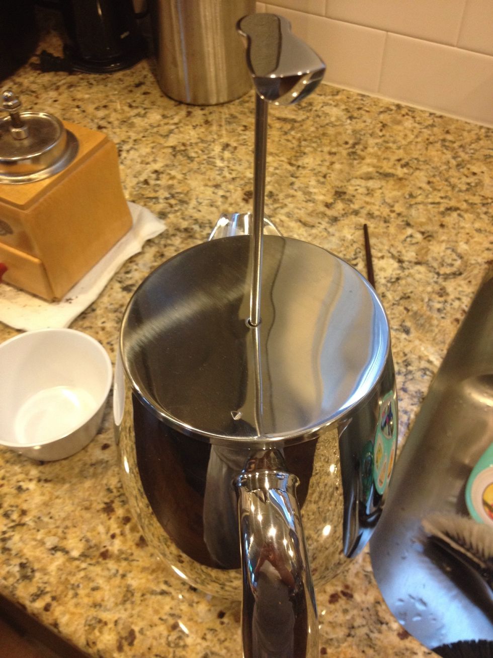 Place the press lid in place.