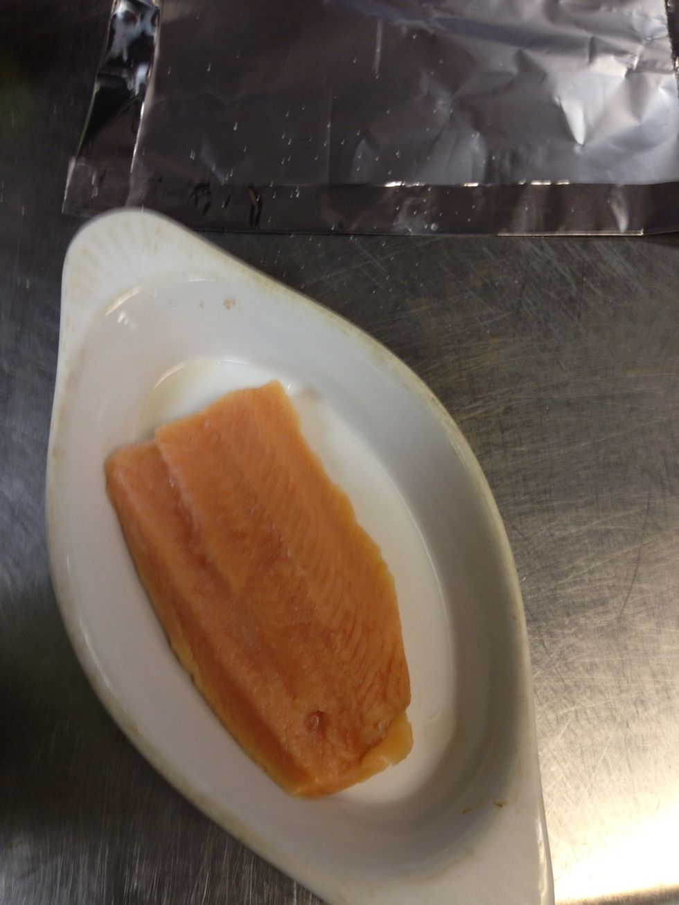 Place the salmon in a deep plate