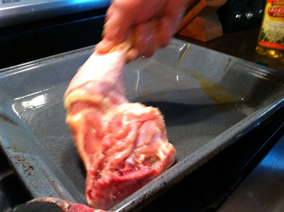Place the seasoned side, the skin side, down to cook first.