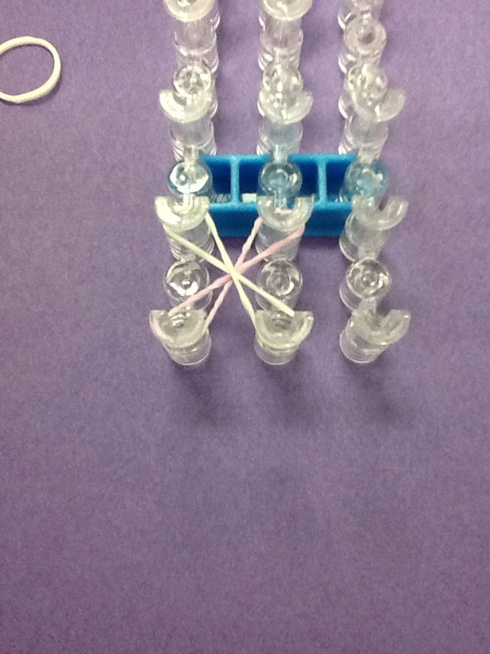 Place the second band on the loom going the other direction as the first.