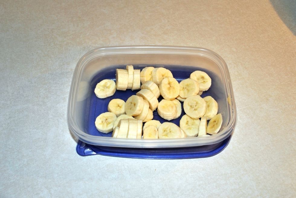 Place the sliced bananas into a freezer-safe container and allow to freeze overnight. If you don't want to wait for overnight freezing, give them at least four to five hours. *Don't freeze unpeeled!*