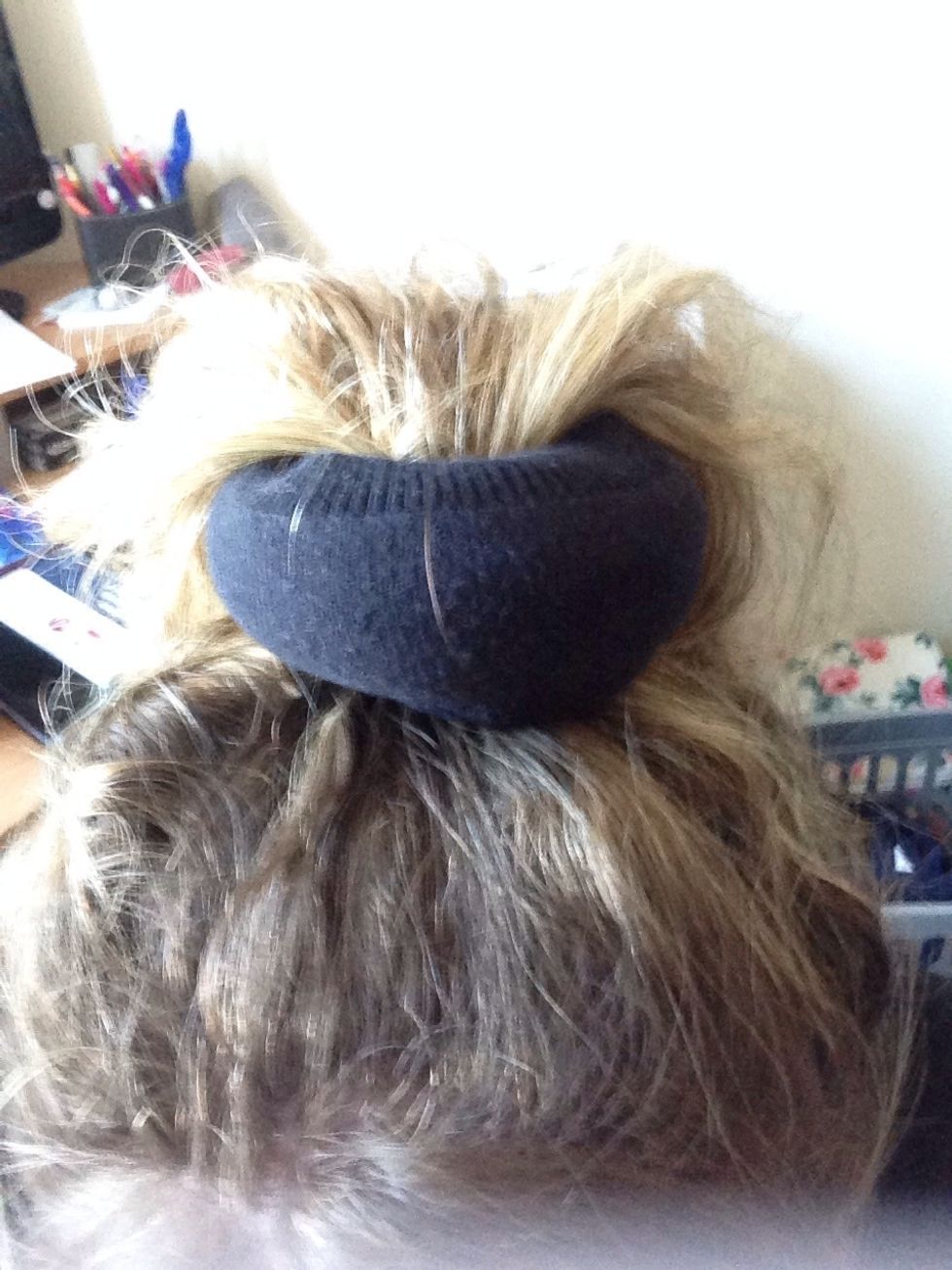 Place the sock bun over