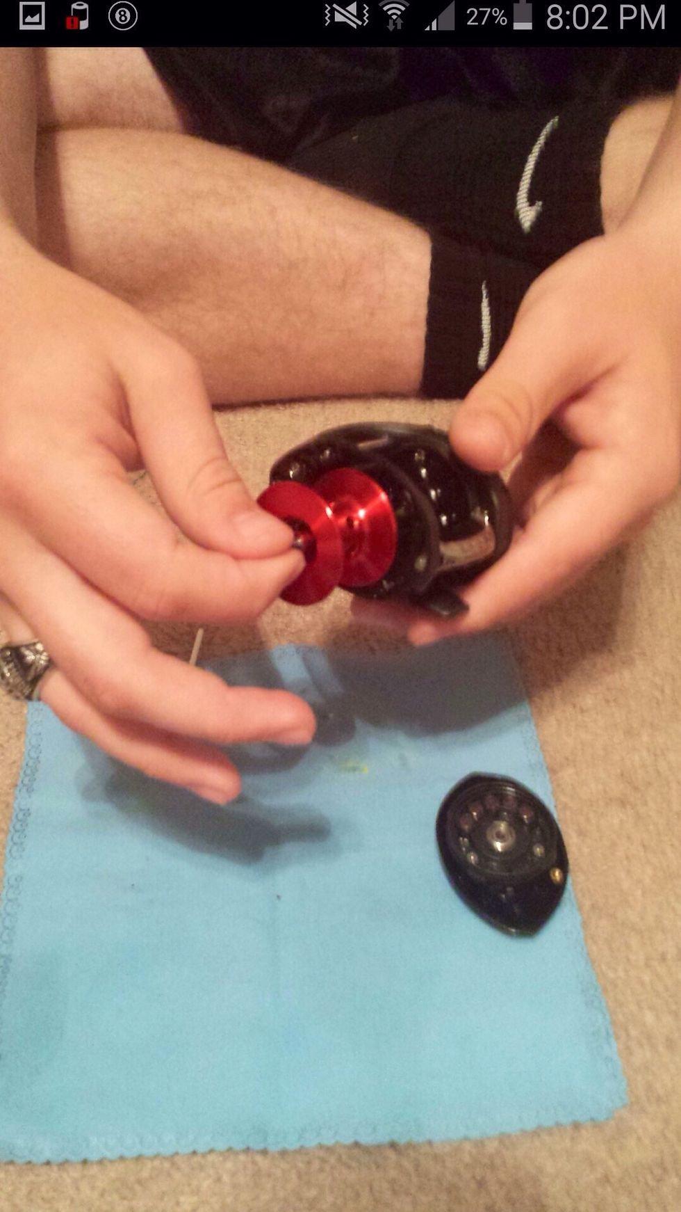 Place the spool back into the main casing.