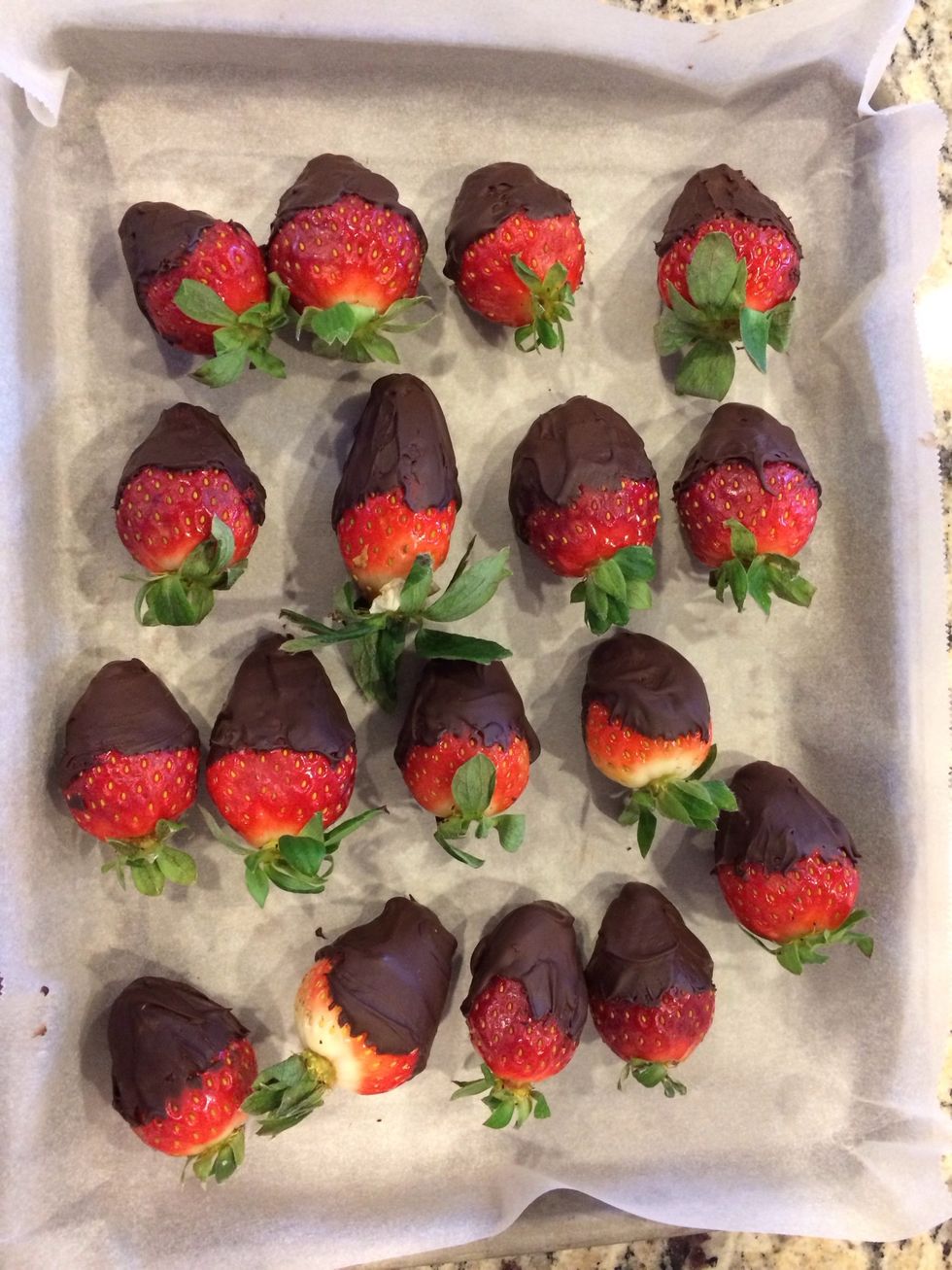 Place the strawberries on the lines tray. When you are done, place the tray in the fridge until you are ready to serve them