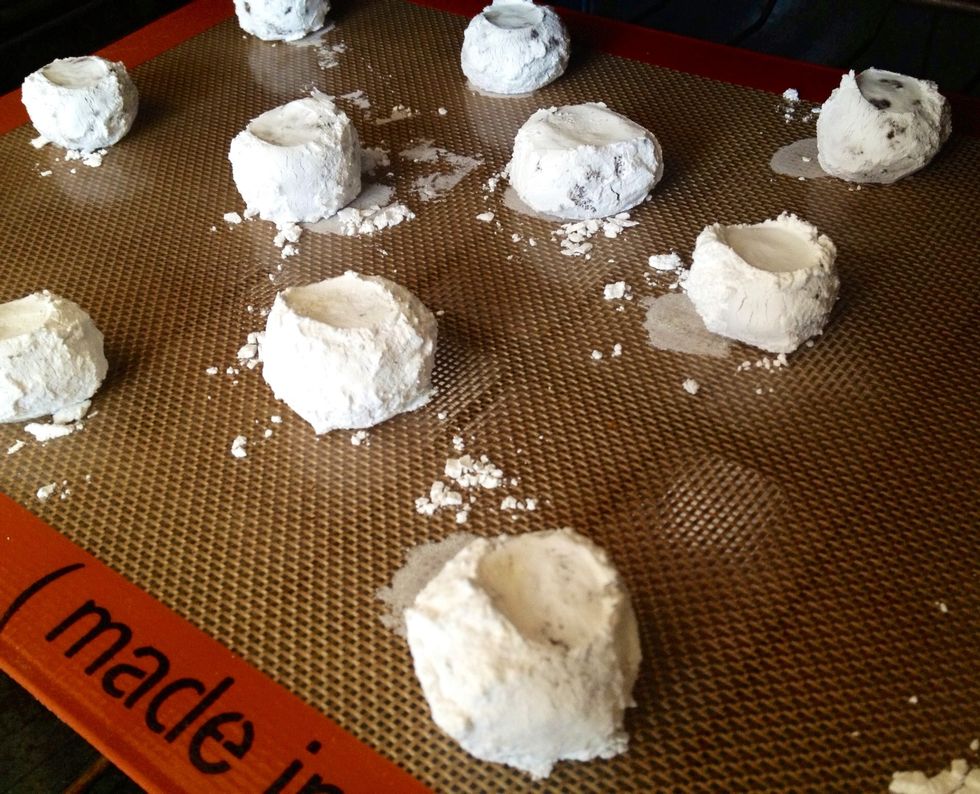 Place the sugar coated balls on a baking sheet about 2 inches apart.
