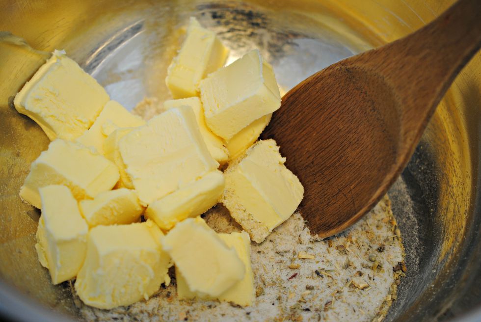 Place the sugar mixture into a bowl and add the butter.