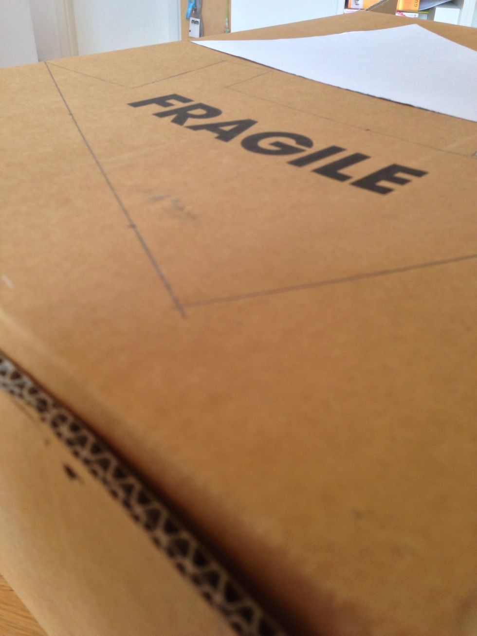 Place the template on a piece of cardboard and trace it with a pen. You will need the triangular shape twice and the long rectangular piece three times for your stand.