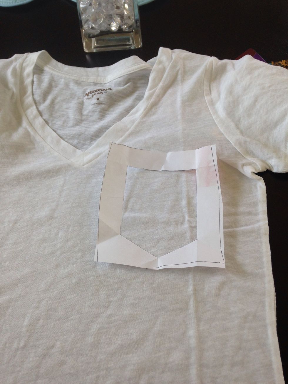 Place the template where you want your pocket. Trying on the shirt will help you see also.