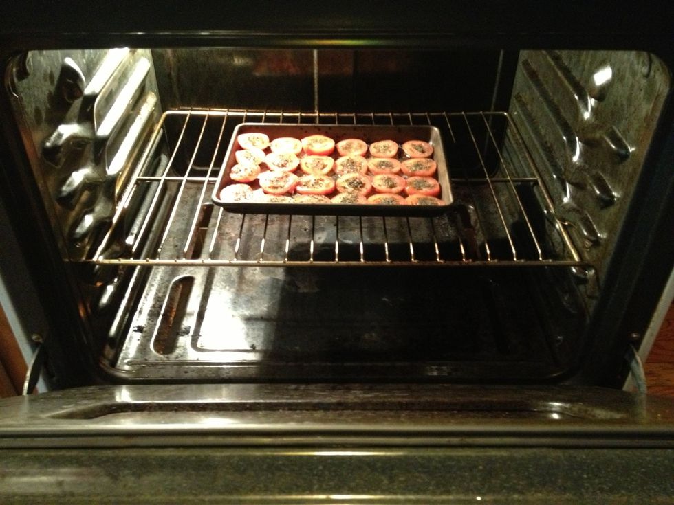 Place the tomatoes in the oven, in the center, on the middle rack, and let them back for 30-45 min.